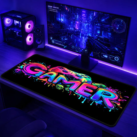 Full flat view of Gamer Glow Drip UV reactive gaming mouse pad.