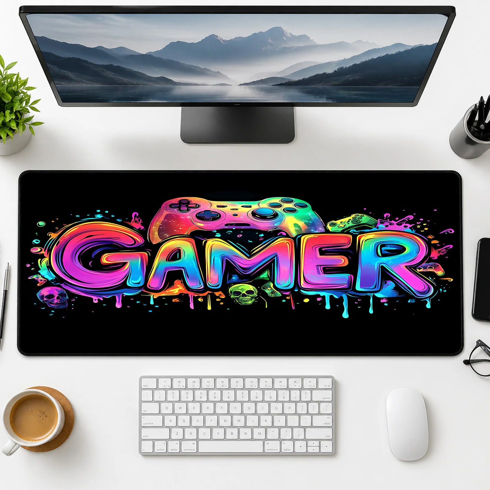 Close-up of 'GAMER' text and main controller on Gamer Glow Drip mat.